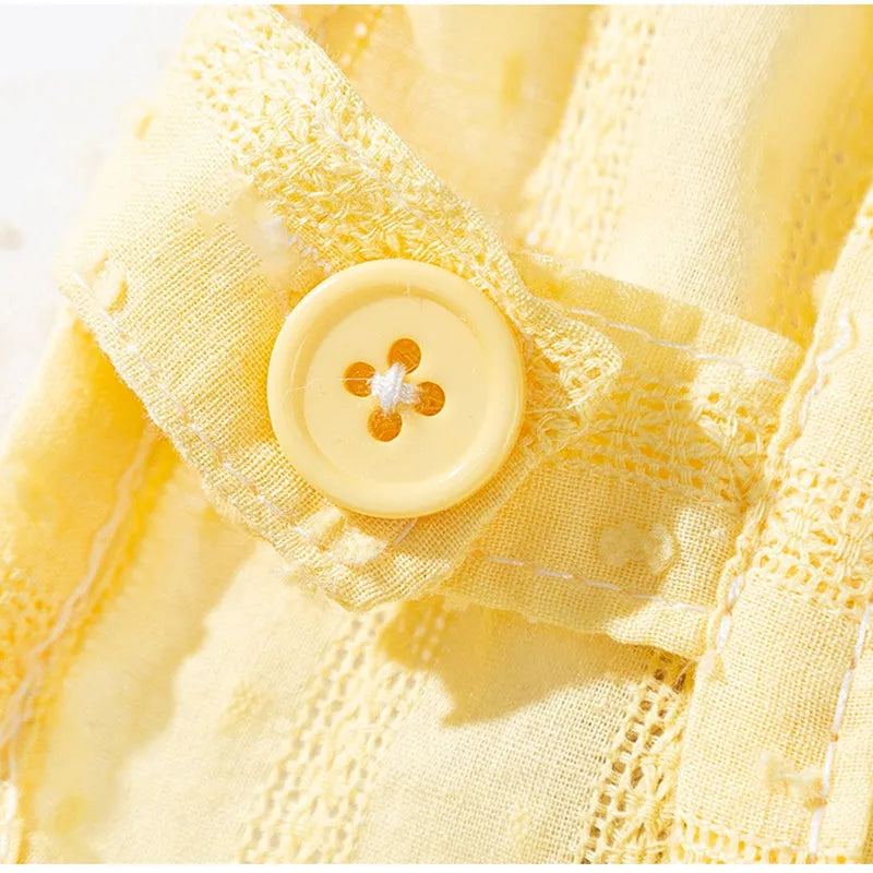 Two-tone sleeveless pet outfit in yellow or blue with ruffles, matching bow and small woven crossbody bag.
