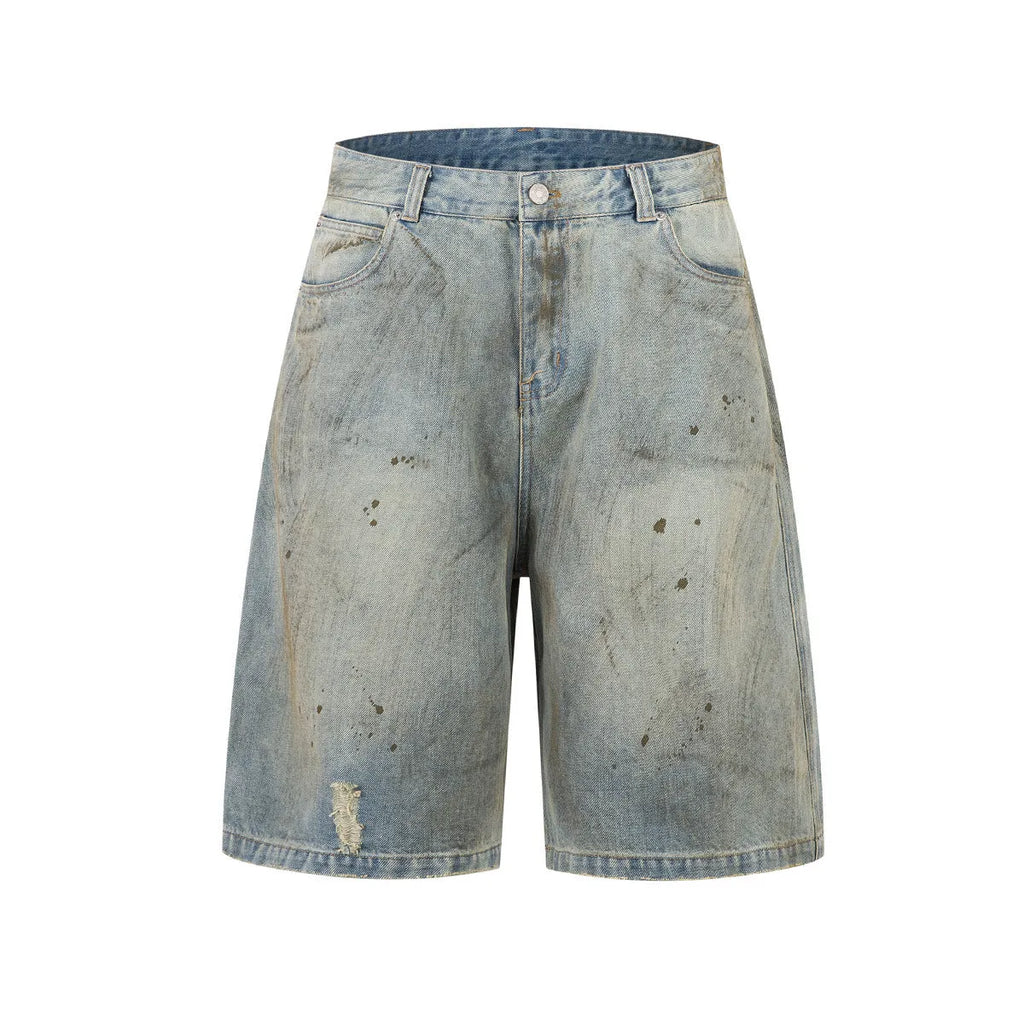 Blue cropped washed denim middle pants with a straight leg and zipper fly on a model.