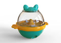 TPR dog puzzle feeder tumbler toy in blue and yellow colours, showing treat dispenser holes.