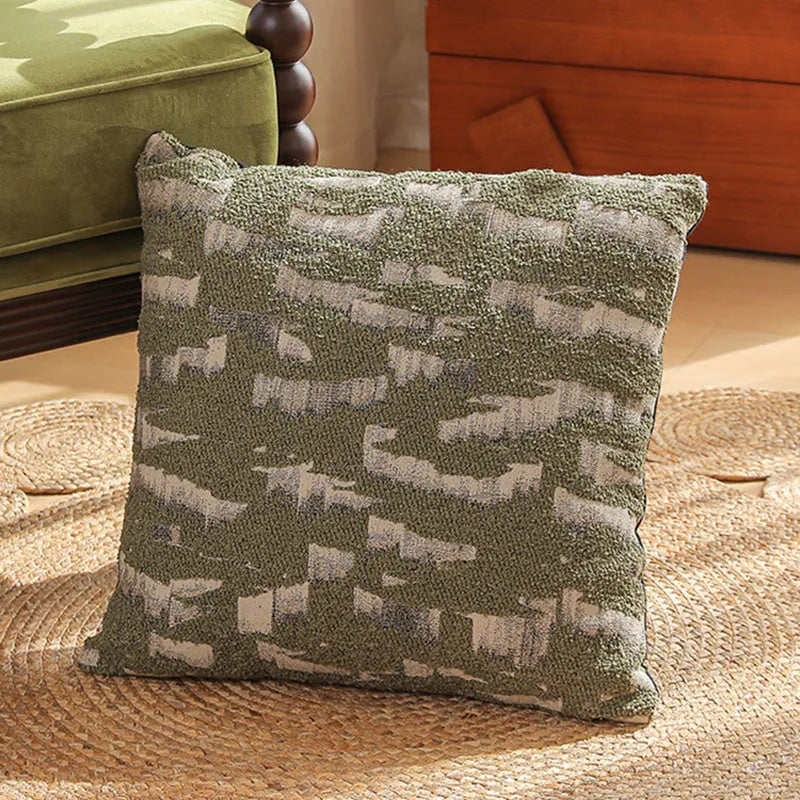 Square jacquard pillow cover with retro botanical pattern, shown in one of eight colour options.
