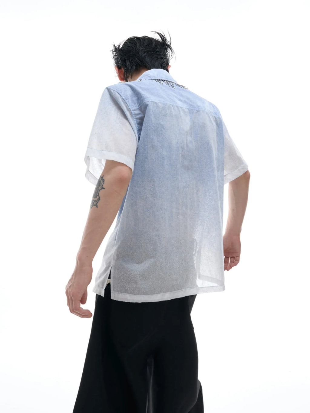 Blue and white gradient loose fit short sleeve casual shirt on a hanger.