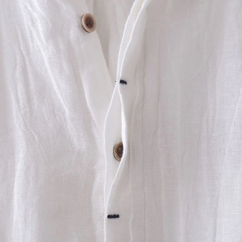 Men's solid colour retro distressed linen shirt in white with relaxed fit and button front