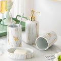 White ceramic bathroom wash set with soap dish, drinking cups, and liquid dispenser in colour gift box