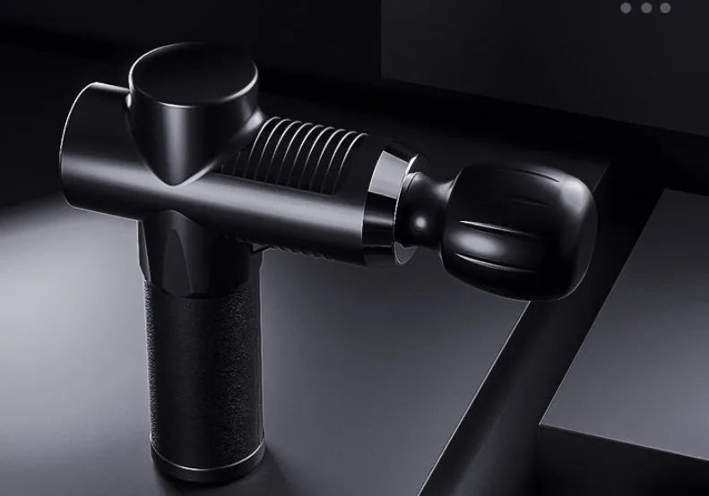 Black fascia gun with silicone head and ABS body for muscle recovery USB powered