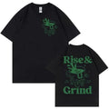 Man's loose fit linen t-shirt featuring a green 'Rise And Grind' coffee cartoon graphic print.