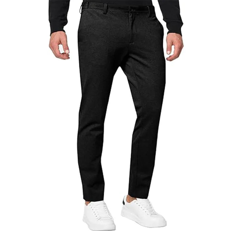 Men's slim-fit tapered chino trousers in Army Green colour, showing zipper fly and casual styling.