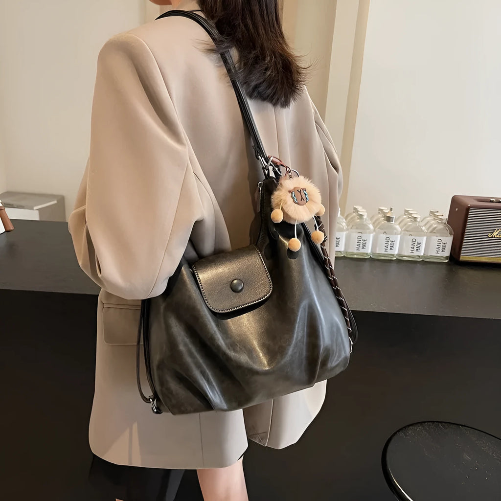 Large capacity textured PU commuter backpack with horizontal square shape and single shoulder strap