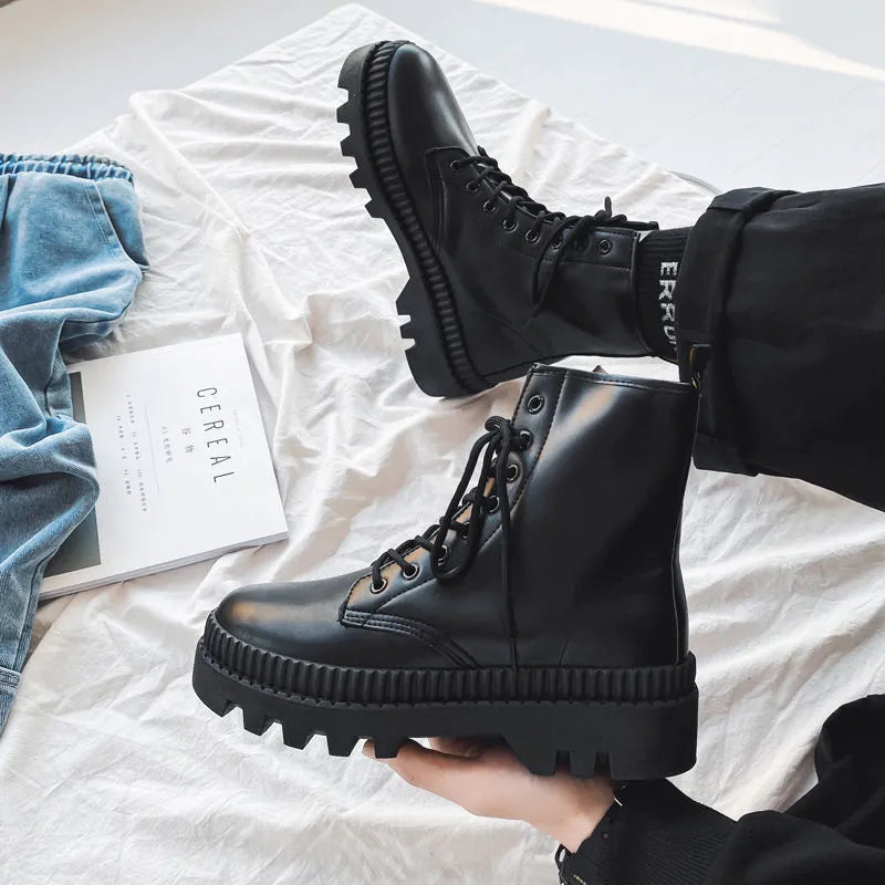 Men's black frosted leather platform ankle boots with a side zip and high-top design.