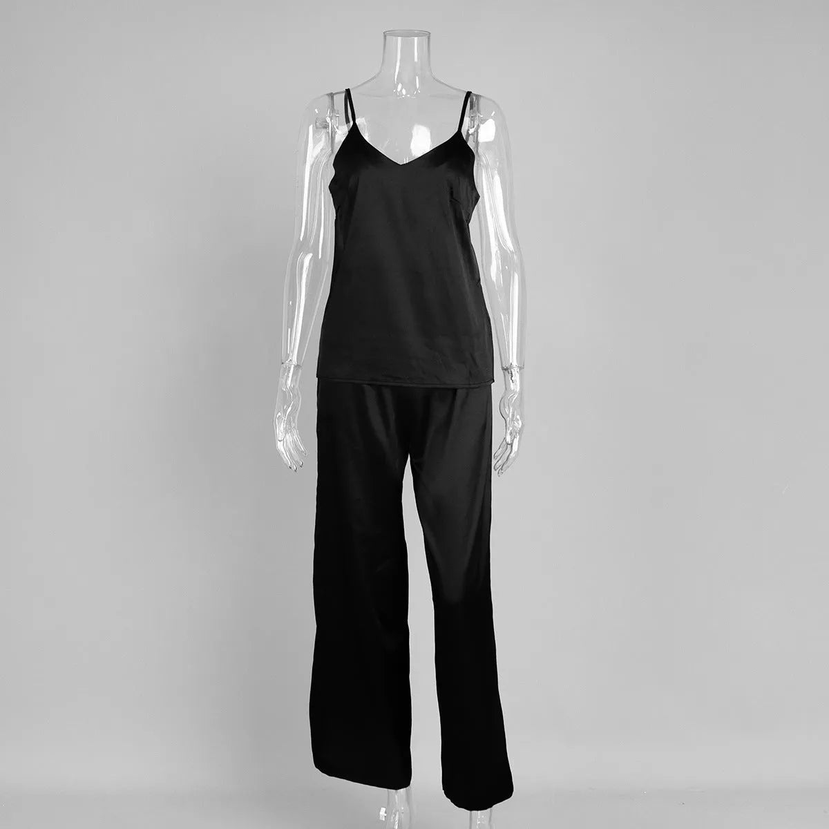 Suspender trousers pajama set in navy blue polyester with adjustable straps on the trouser waist