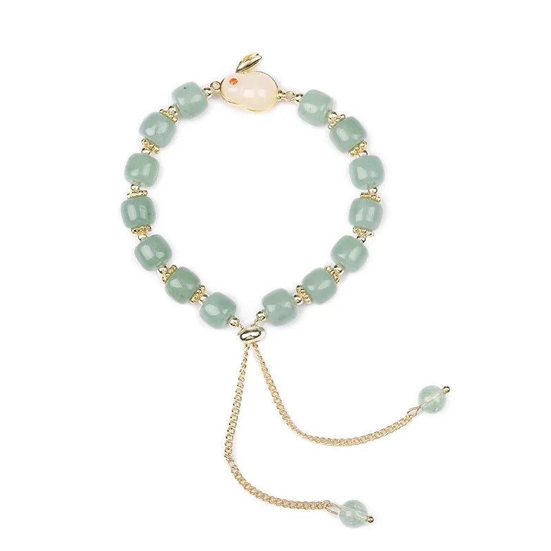 Rabbit bracelet with green aventurine and strawberry quartz beads, copper and gold-plated details