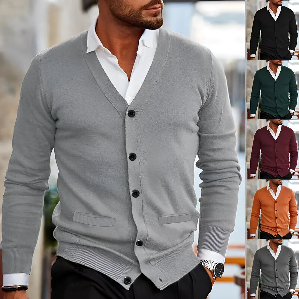 A man wearing a slim-fit, long-sleeve acrylic cardigan sweater coat in a dark green colour.
