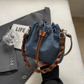 Blue synthetic leather cross body bucket bag with messenger design and shoulder strap