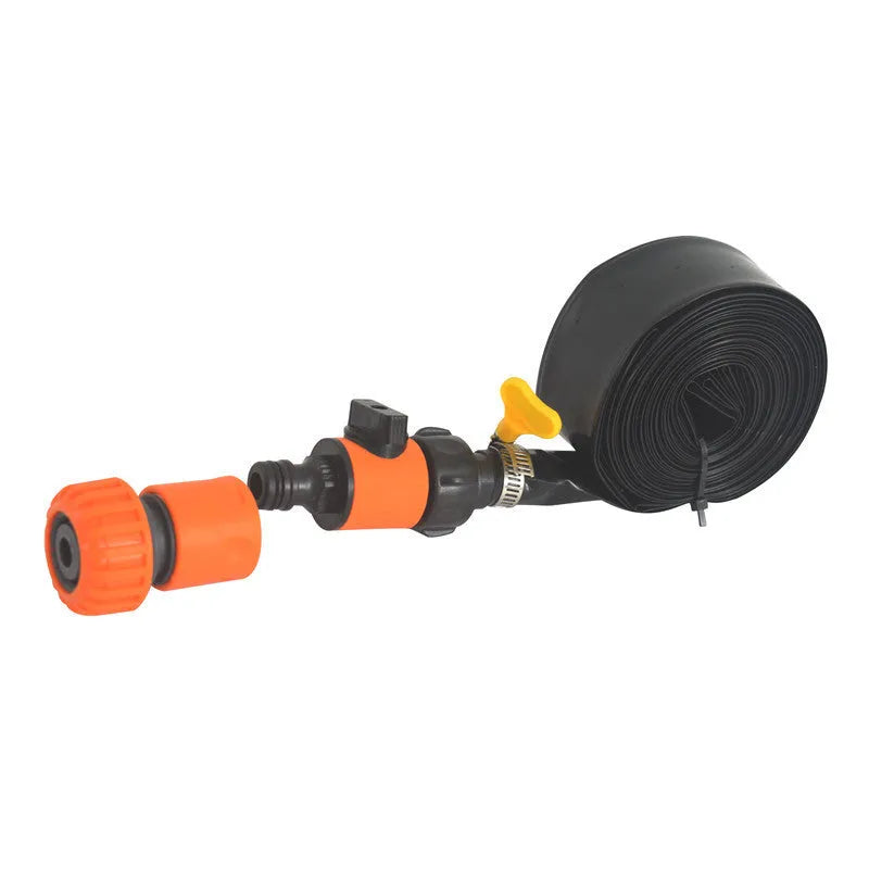 Blue portable PVC garden sprinkler with solar water cooling feature laid out on grass.