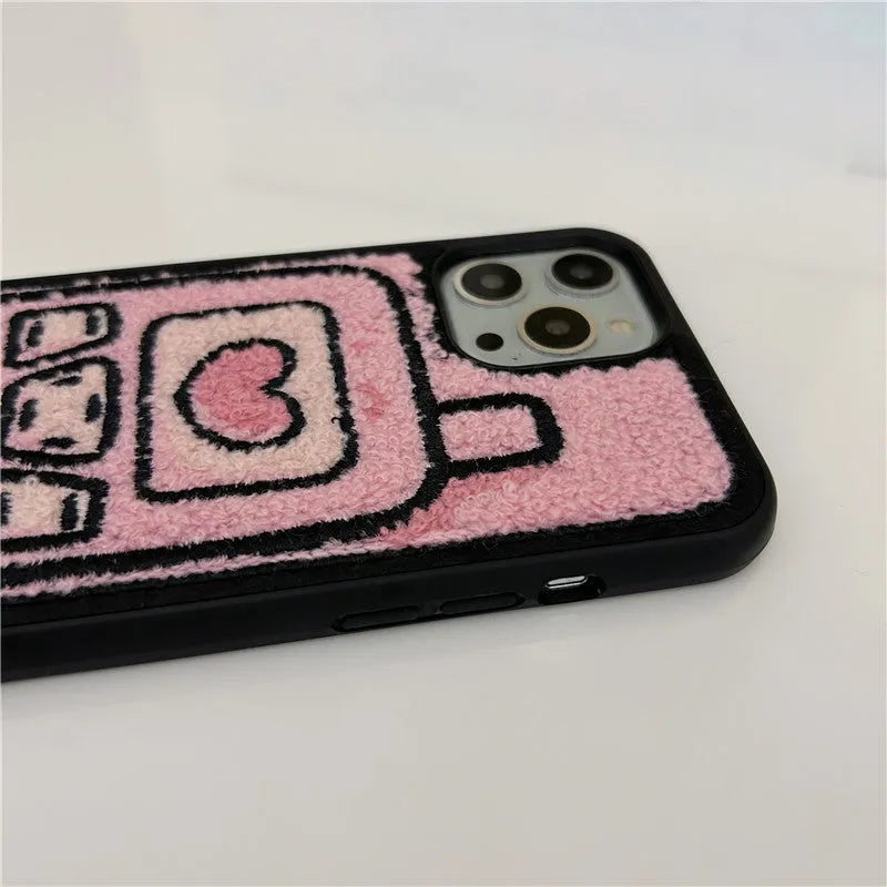 Pink TPU iPhone back cover case with a textured towel embroidered design.