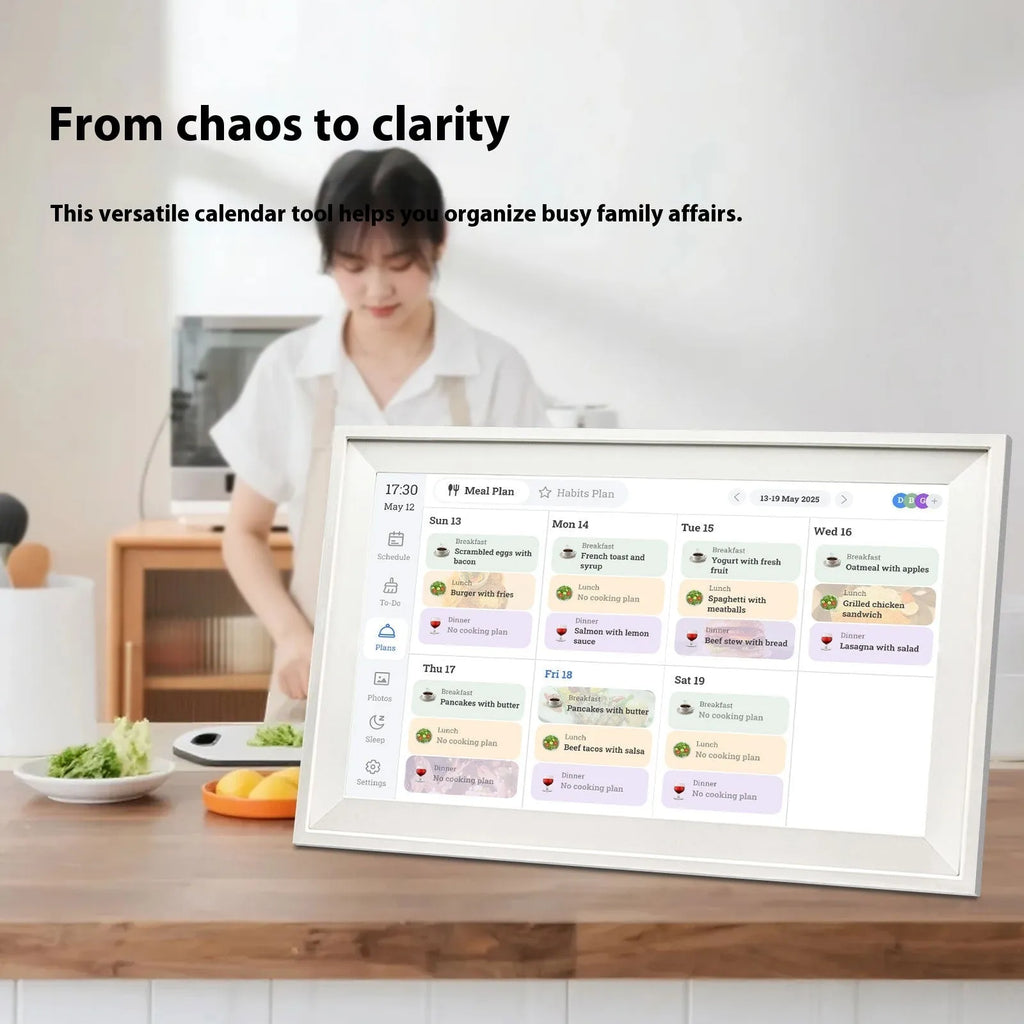 White 15.6 inch smart digital photo frame with app control on a wooden table