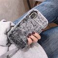 Rabbit hair silicone iPhone case with rhinestone detail, back cover in grey brown or pink plush for Apple iPhone models.