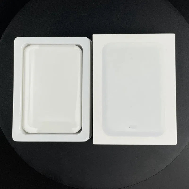 White magnetic wireless charger power bank showing compact dimensions and creative design