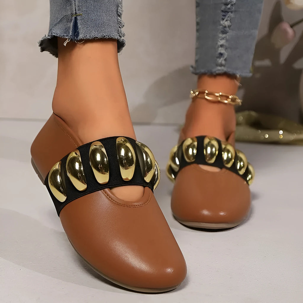 Brown artificial PU flat loafers for women with metal buckle and round toe, side view