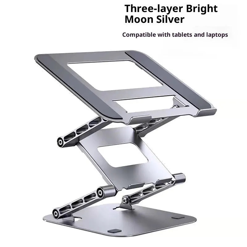 Three-layer elevated laptop stand in Bright Moon Silver on a desk with a laptop below 15.6 inches