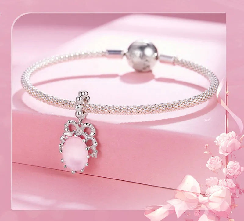 925 silver bow-shaped DIY pendant with electroplated finish, height 2.4cm, width 1.2cm, aperture 0.45cm