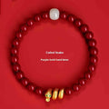 Handmade cinnabar snake year zodiac bracelet showing snake bead detail