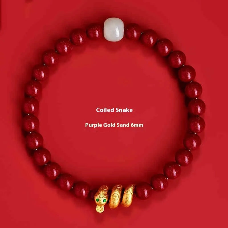 Handmade cinnabar snake year zodiac bracelet showing snake bead detail