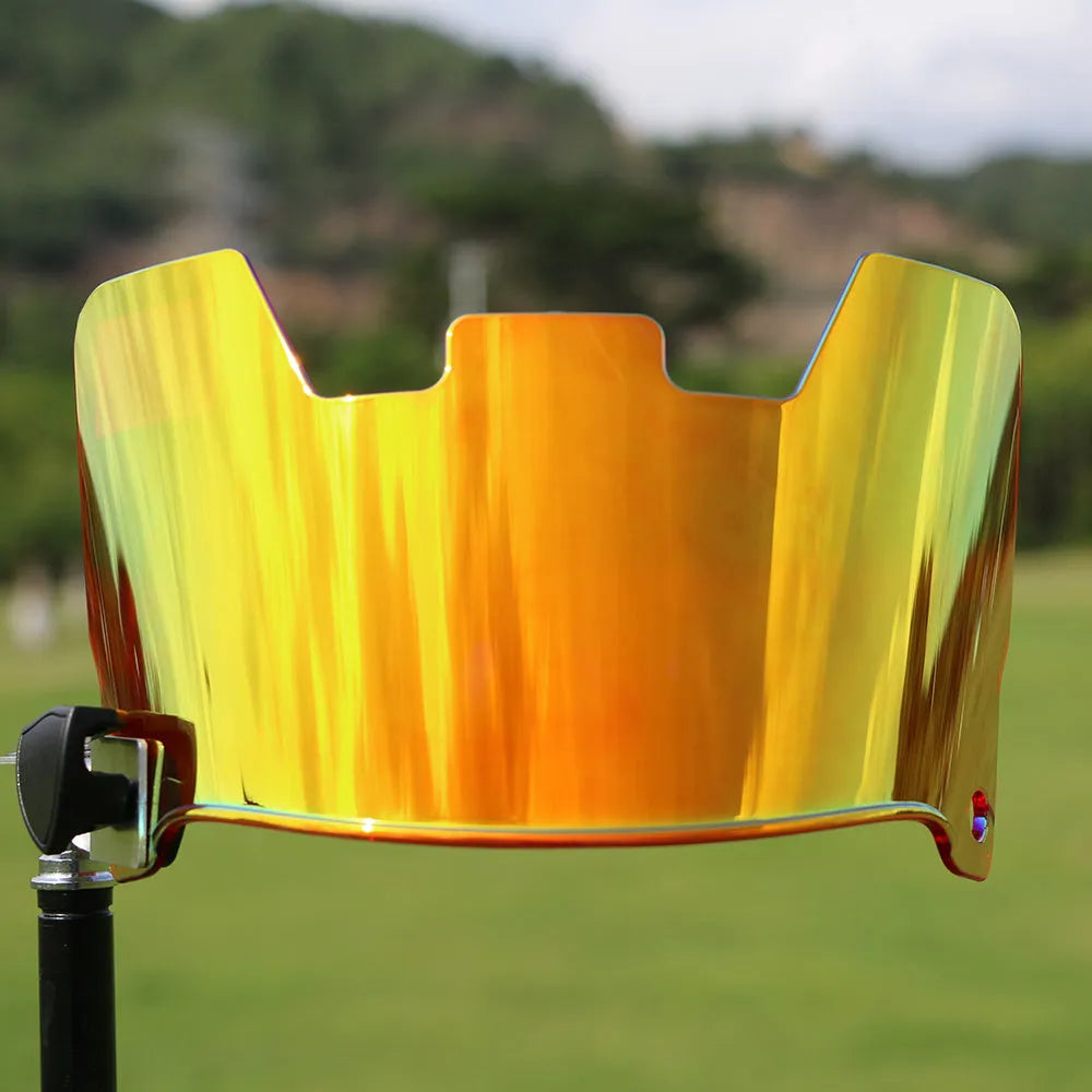 Multicolour rugby goggles attaching to an American style rugby helmet with clip-on system