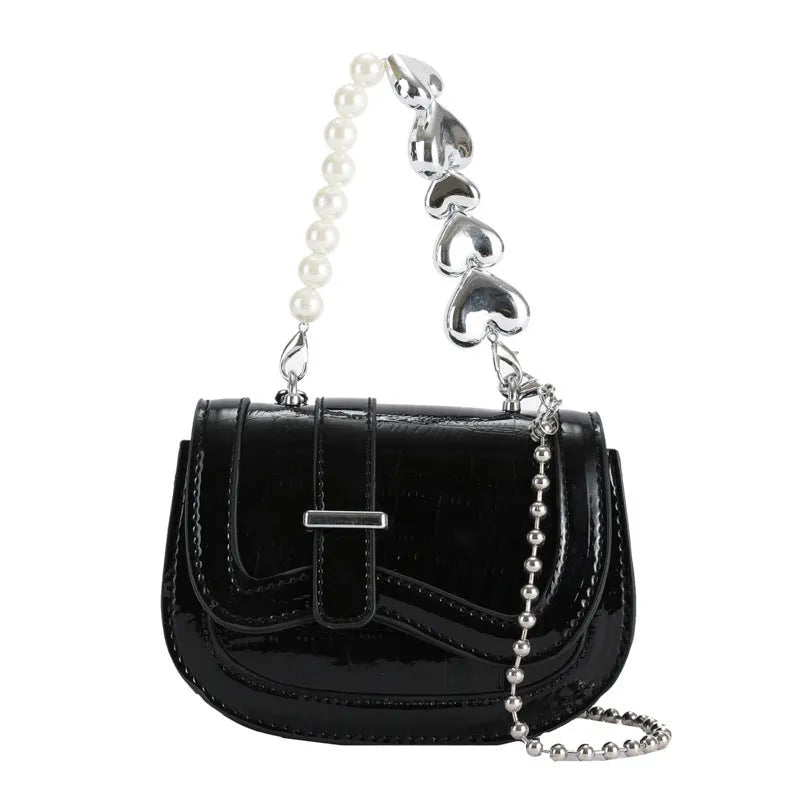 Silver women's PU leather crossbody bag in a horizontal square tote saddle shape with a single strap.