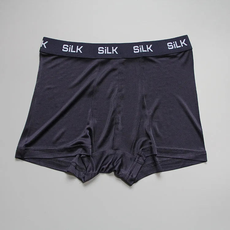 Men's loose fit silk shorts in navy blue, silver grey, or skin colour with mid-waist design