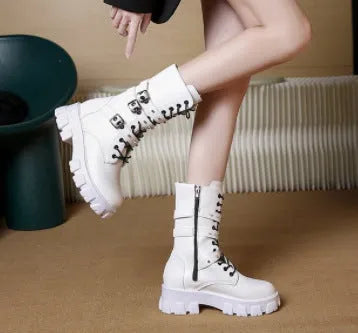 Black women's mid-calf boots with a metal buckle strap and side zip on a round toe.