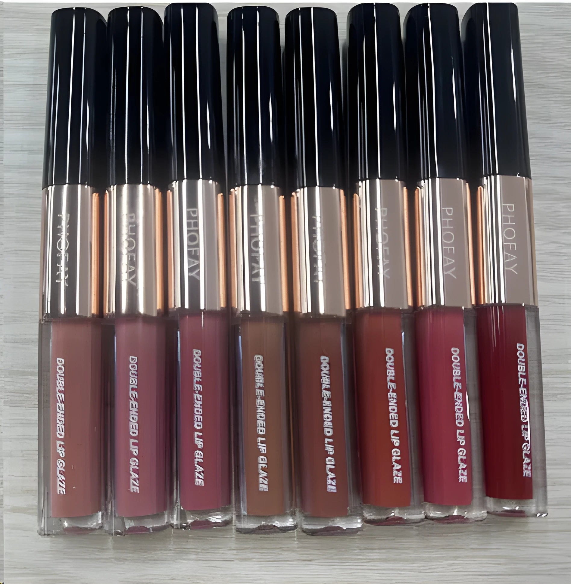 C-L021 double-head lip gloss with non-stick cup applicator shown in colour shades 01 to 08