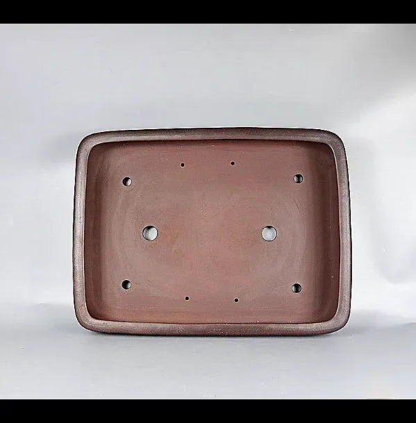 Handmade antique rectangular purple clay flower pot showing its size and shape.