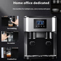 Black desktop ice maker with stainless steel accents on a kitchen countertop