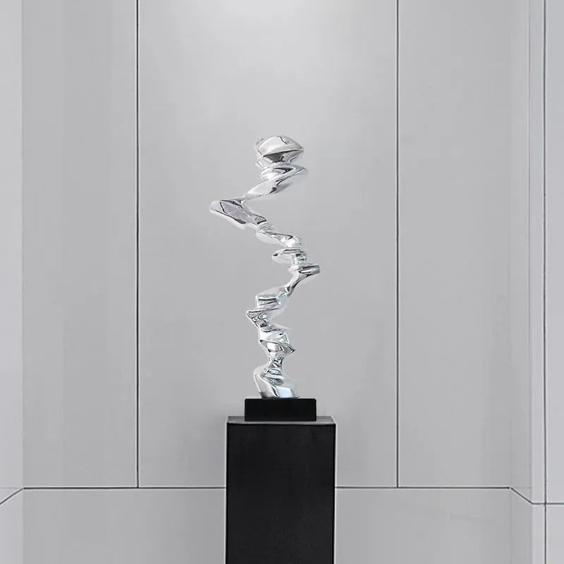 Abstract still life resin sculpture in minimalist modern design available in three colour finishes