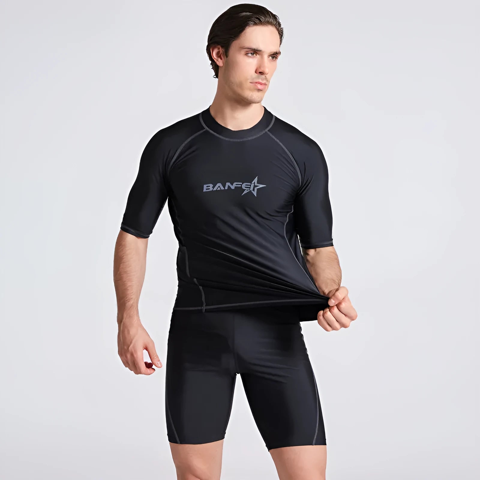 Men's quick-dry half sleeve swimsuit set in nylon fabric for snorkelling and surfing activities