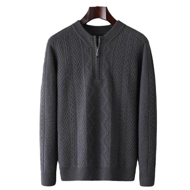 Man wearing a beige pure wool diamond pattern half-zip sweater with a loose fit.