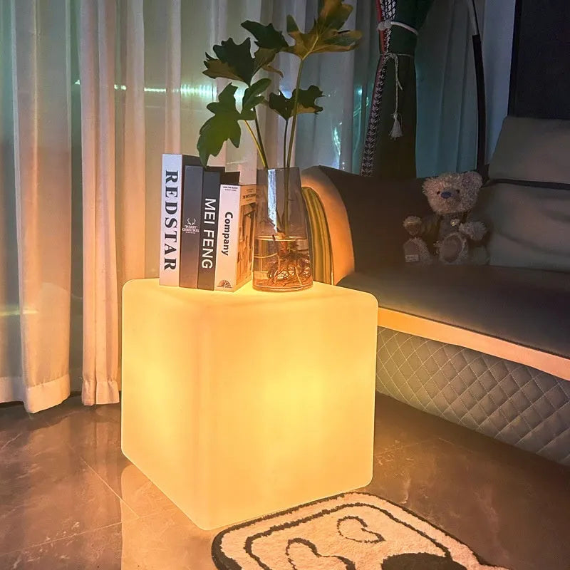 Square waterproof LED cube light stool in a modern style for outdoor garden use.