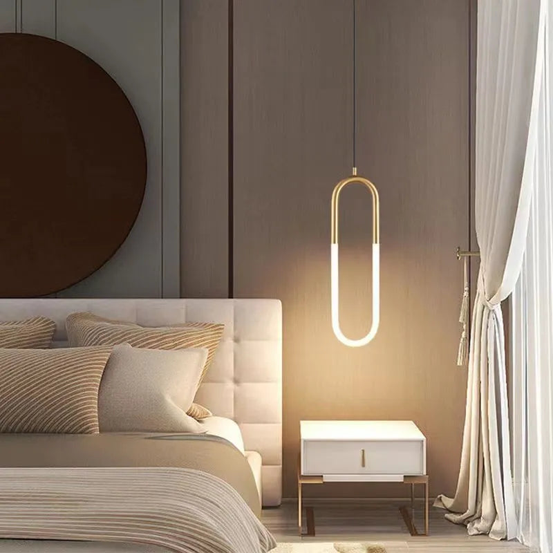 Modern Nordic style U-shaped metal pendant light with a long 200cm drop, ideal for bedside lighting.