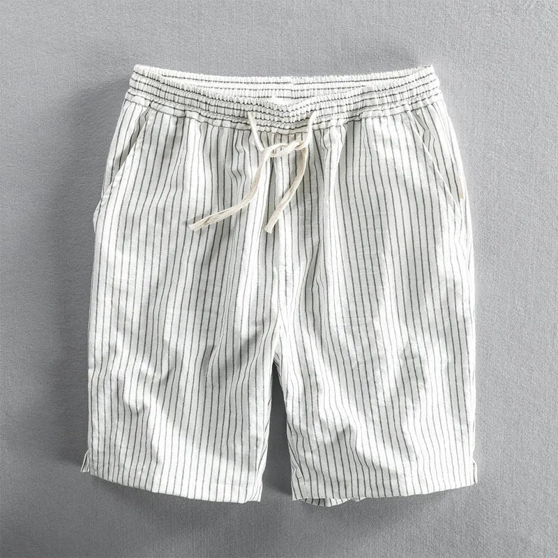 Men's striped casual shorts with elastic waistband in turmeric colour showing loose straight cut