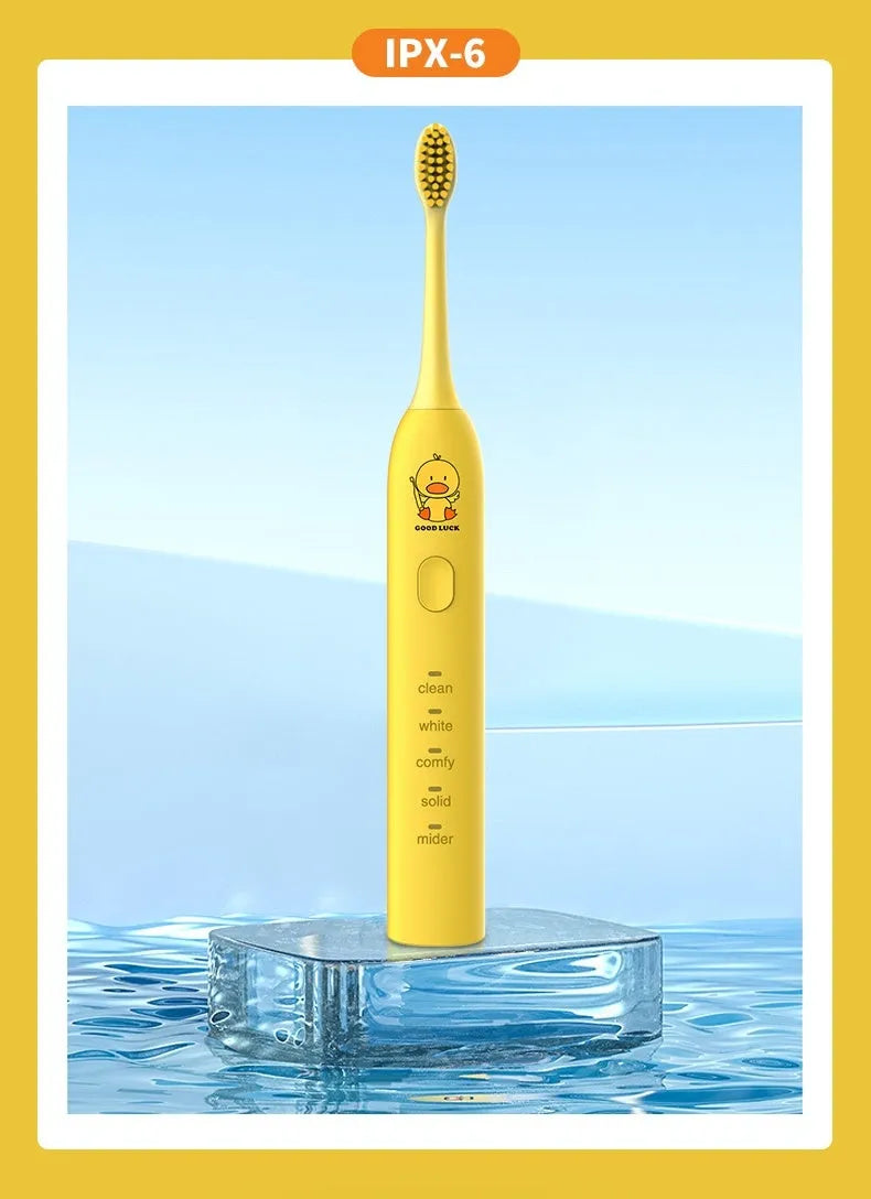 Yellow duck design rechargeable electric toothbrush with soft bristles on a white background.