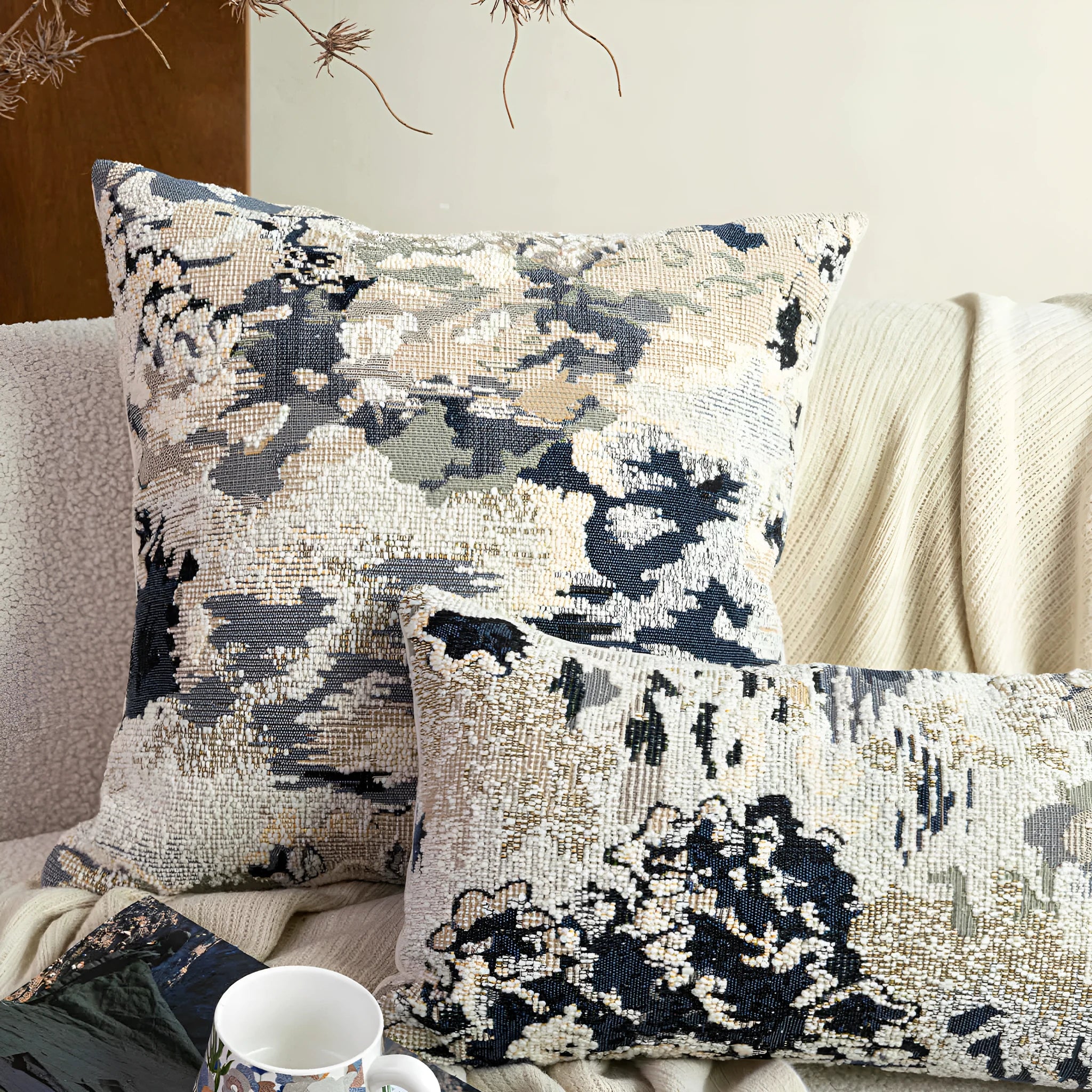 Antique blue decorative cushion with abstract flower pattern in Chinese style, shown in square and waist pillow sizes.
