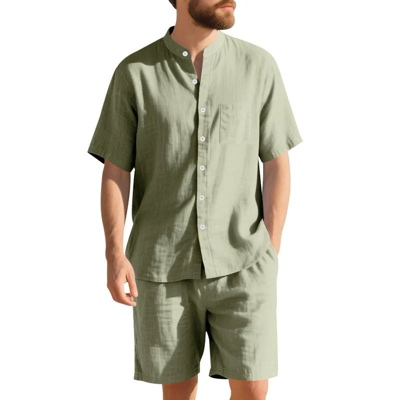 Men's light blue linen blend summer suit with henry collar shirt and shorts on a hanger.
