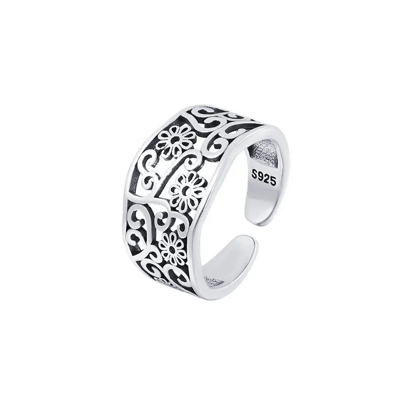 Silver plated open ring with hollow flower design, adjustable opening, retro style, colour retro JZ02137