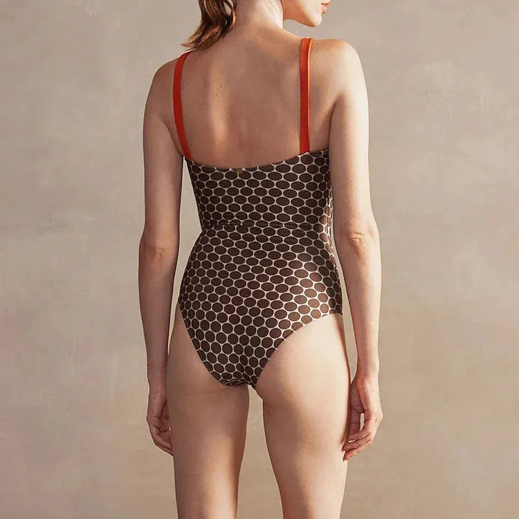 Women's dot pattern one-piece swimsuit with matching wrap skirt set
