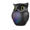 Black wireless Bluetooth speaker with cartoon owl design, compact size