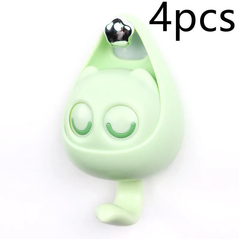 Cream white cat-shaped adhesive wall hook with winking eyes, 2.5kg capacity, 105x61x45mm
