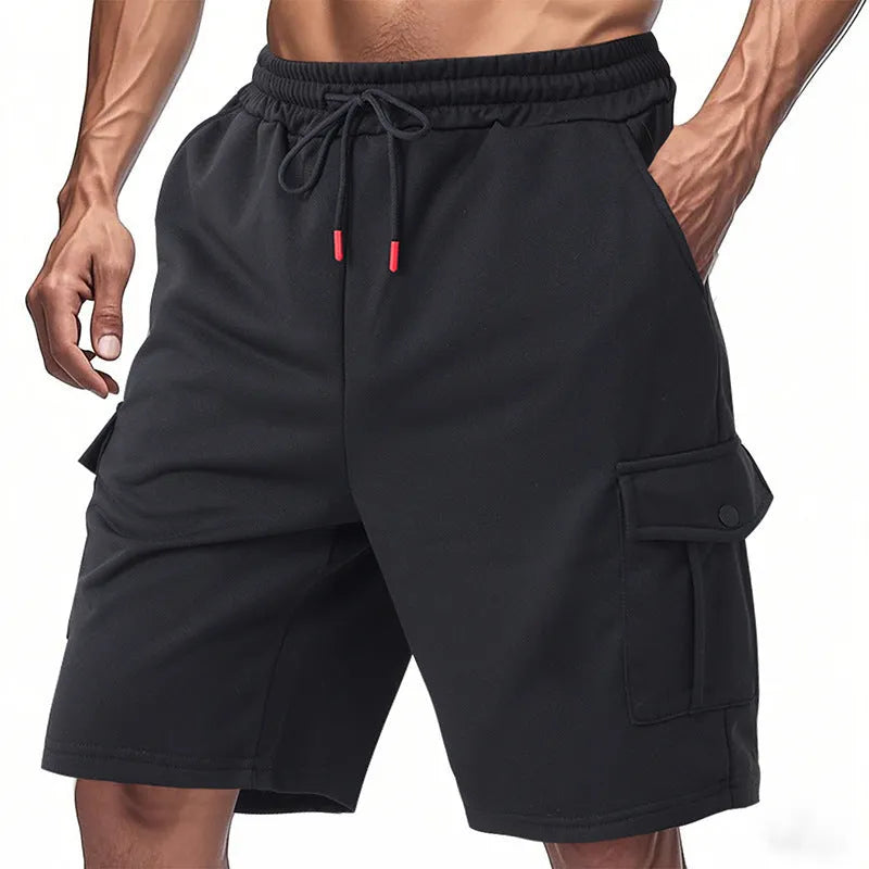Men's loose grey terry fabric cargo shorts with multiple pockets on a hanger.
