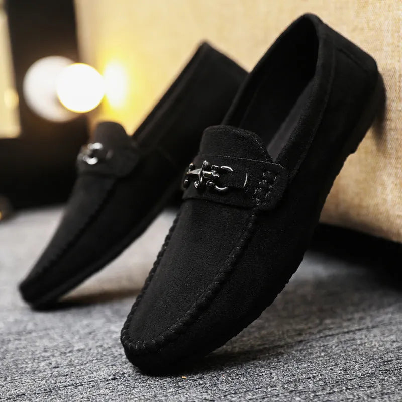 Men's black waterproof slip-on loafers with artificial PU leather upper and rubber sole.