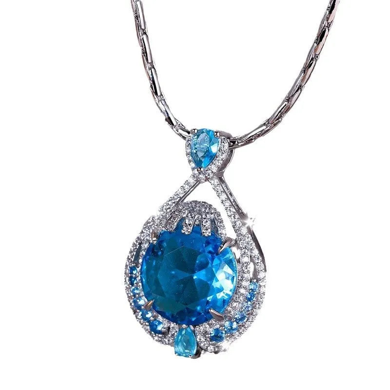Blue fireworks-cut crystal geometric pendant necklace on water wave chain