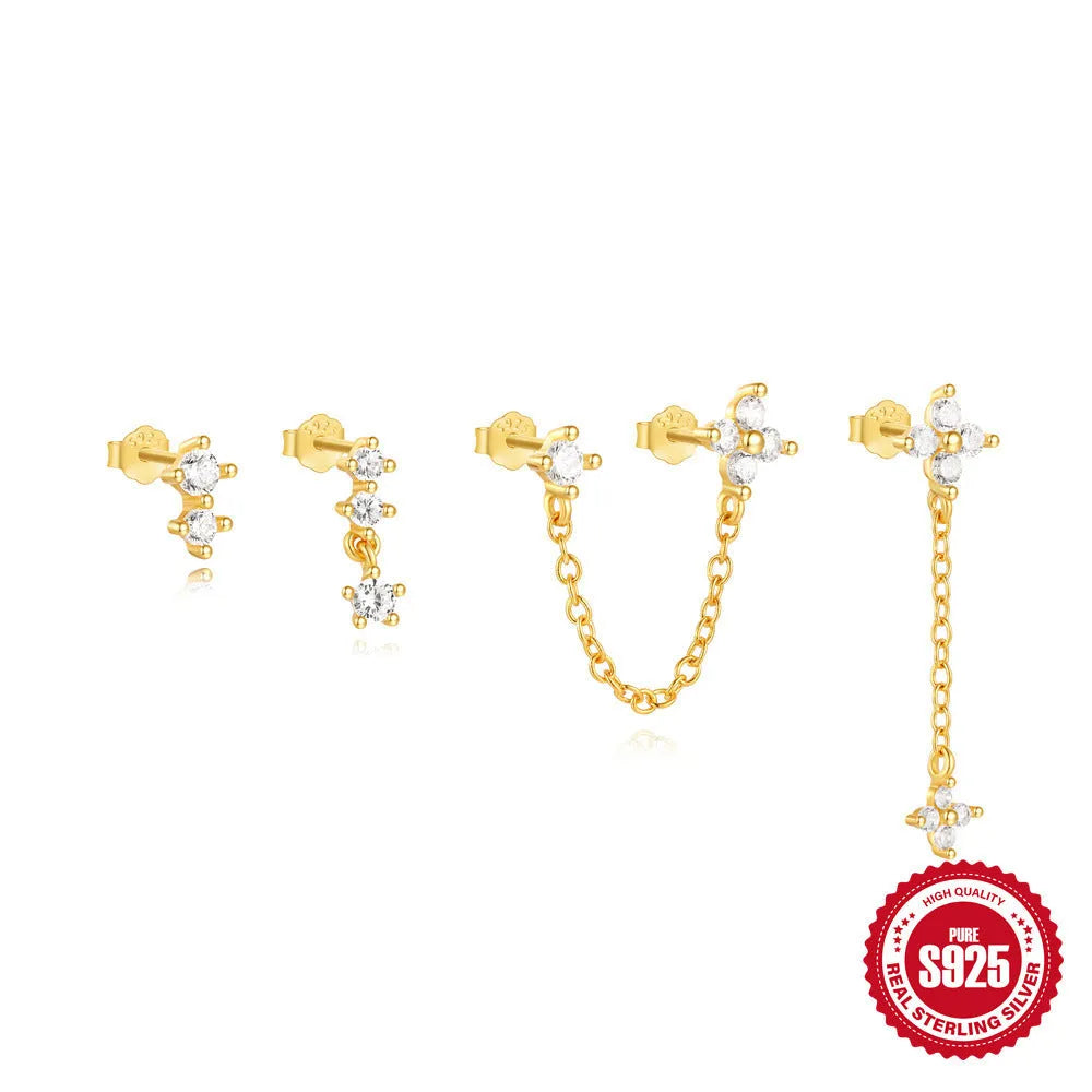 Simple geometric sterling silver earrings with a clover petal design and electroplated gold accents.